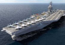 A Submarine Kill Mark Raises Questions Aircraft carrier at sea with fighter jets on deck