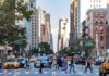 One-Year-Old Killed After Crosswalk Crash Busy city street with pedestrians crossing and yellow taxis